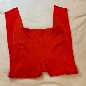 Fila Sport Bright Coral Leggings in Size XS. NWOT. Deep side pockets.